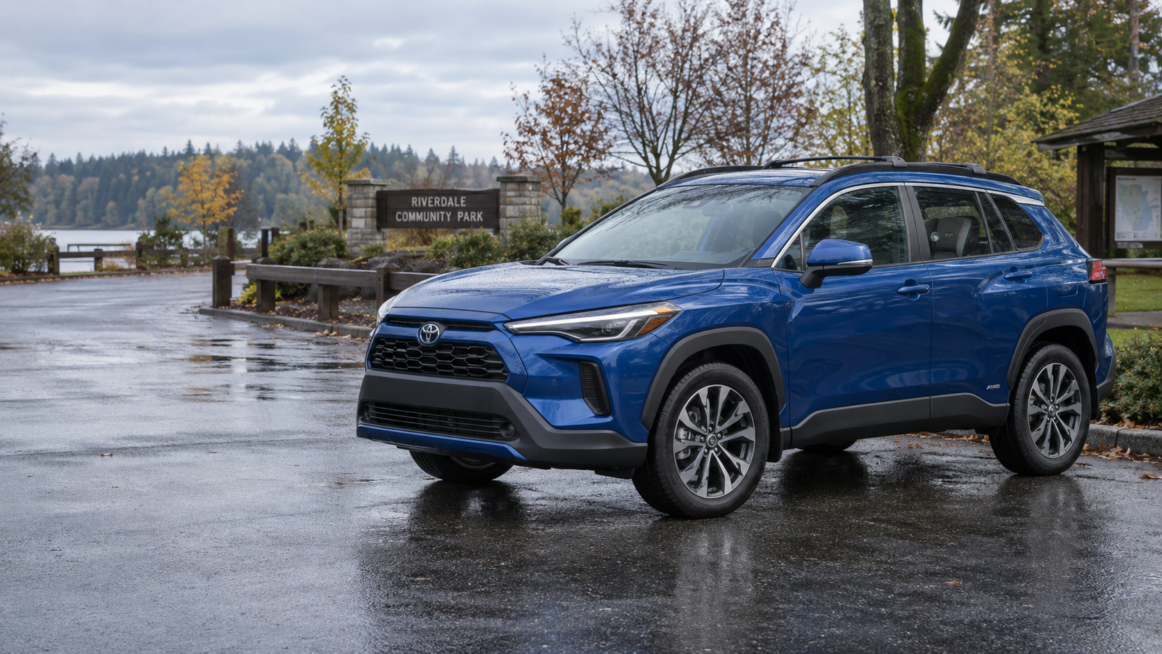 Toyota Corolla Cross Hybrid 2026 azul junto a un parque familiar después de la lluvia